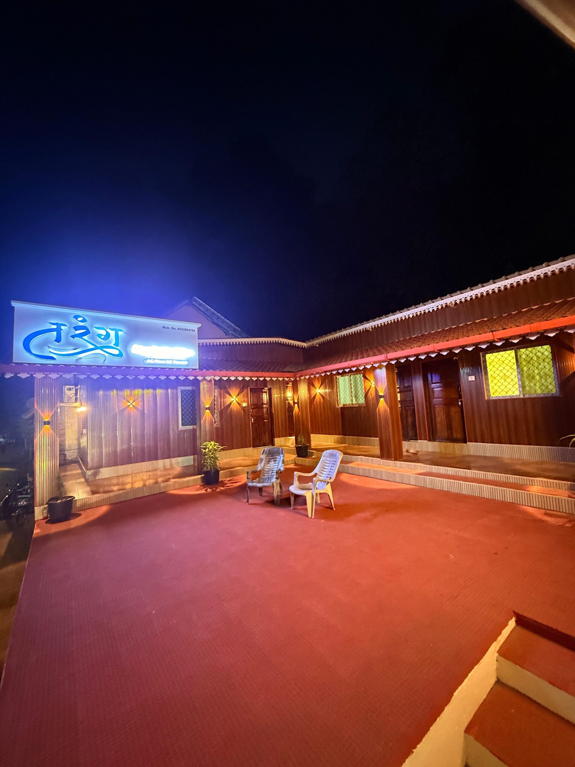 Open courtyard with seating at Tarang, Vengurla